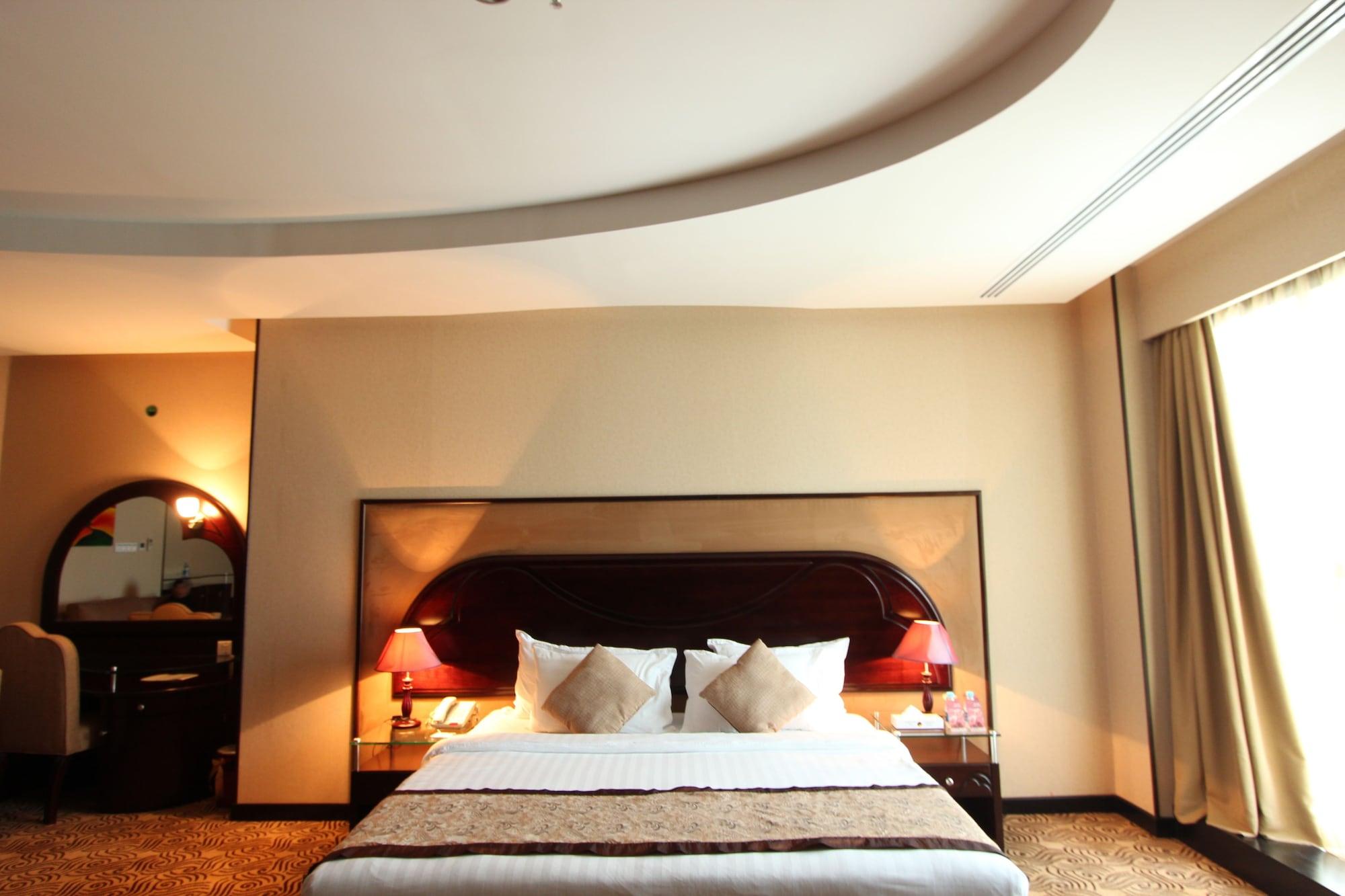 아와리브 인터내셔널 호텔 타이프 외부 사진 A bedroom at the hotel